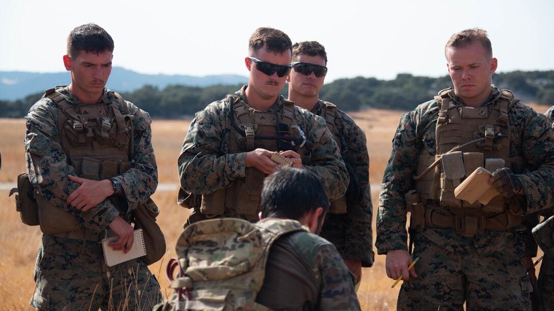 A Spanish soldier discusses the ground scheme of maneuver during a bilateral exercise in Ronda, Spain, Sept. 4, 2019. U.S. Marines with Special Purpose Marine Air-Ground Task Force-Crisis Response-Africa 19.2, Marine Forces Europe and Africa, trained alongside their Spanish counterparts to increase proficiency as a crisis response force and enhance bilateral interoperability with their allies. SPMAGTF-CR-AF is deployed to conduct crisis-response and theater-security operations in Africa and promote regional stability by conducting military-to-military training exercises throughout Europe and Africa. (U.S. Marine Corps photo by Lance Cpl. Gumchol Cho)