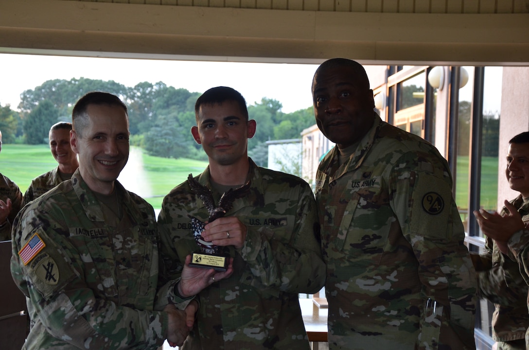 Sgt. Antonio Delgado, 5/80th Ordnance Battalion, 2nd Brigade (Ordnance), 94th Training Division – Force Sustainment, earns the Best Warrior trophy at the conclusion of the 94th's 2019 Best Warrior Competition at Joint Base McGuire–Dix–Lakehurst, New Jersey. Army Reserve competitors' mental and physical toughness was put to the test as they endured early morning and late-night events where only one competitor would claim the title for this competition.