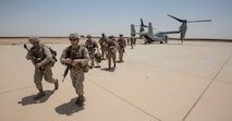 After a cyberattack, the waiting is the hardest part: U.S. Marines debark from an MV-22B Osprey at Al Asad Air Base, Iraq in June 2018. A cyberattack could slow how U.S. forces respond to a battlefield.
