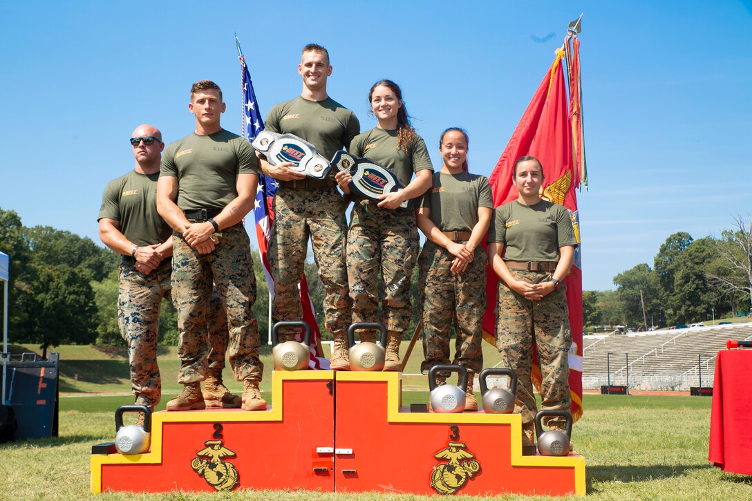 (From left to right) U.S. Marines 1st Lt. Tyler Watkins, Sgt. Anthony Gates, Sgt. Kevin Fisch, Cpl. Alexandra Martin, Capt. Stefanie Allen, and 1st Lt. France Moore won the first, second and third place of the 2019 High Intensity Tactical Training Championship aboard Marine Corps Base Quantico, Sept. 12, 2019. Martin came in first place, as well as Fisch, who won for the second year in a row. Competitors from all across the Marine Corps battle for the title of HITT Champion. The championship spans over four days, and includes seven challenges, which test the athletes’ physical and mental fortitude.