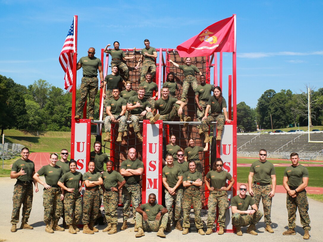 Participants of the 2019 High Intensity Tactical Training Championship celebrate completing the competition, which spans over four days, and includes seven challenges testing the athletes’ physical and mental fortitude, aboard Marine Corps Base Quantico on Sept. 12, 2019. Competitors from all across the Marine Corps battle for the title of HITT Champion.