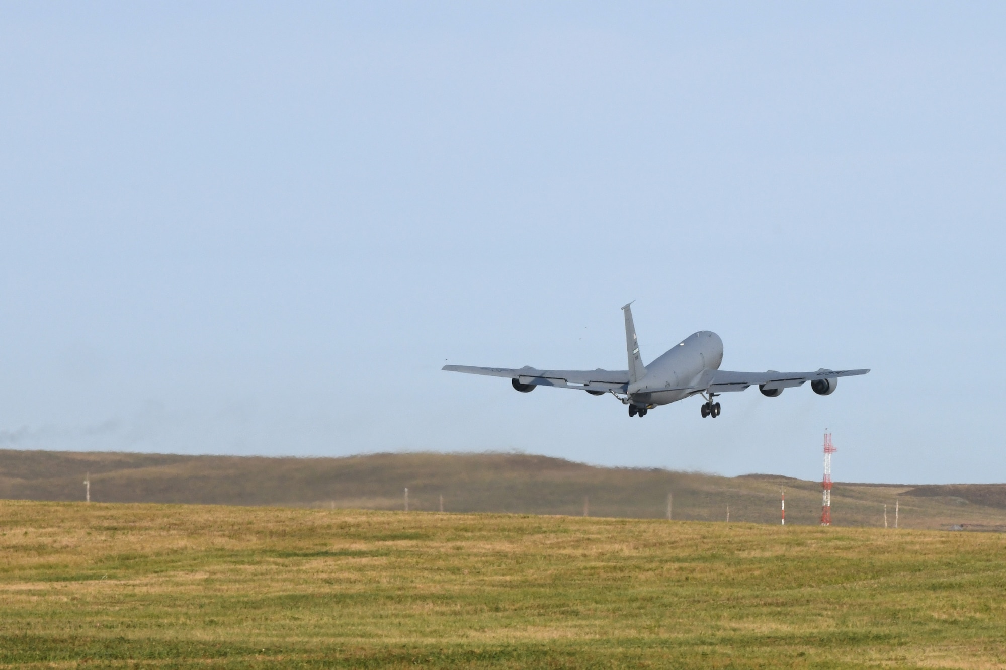 A KC-135 Stratotanker departs from the flight line on Ellsworth Air Force Base, S.D., Sept. 10, 2019. The KC-135 is an aerial refueling aircraft – its primary fueling method utilizes the tanker’s boom. The boom is a long adjustable tube, which is controlled by a boom operator. The boom – situated toward the tail-end of the aircraft – is extended and inserted into the aircraft receiving fuel. (U.S. Air Force photo by Airman 1st Class Christina Bennett)