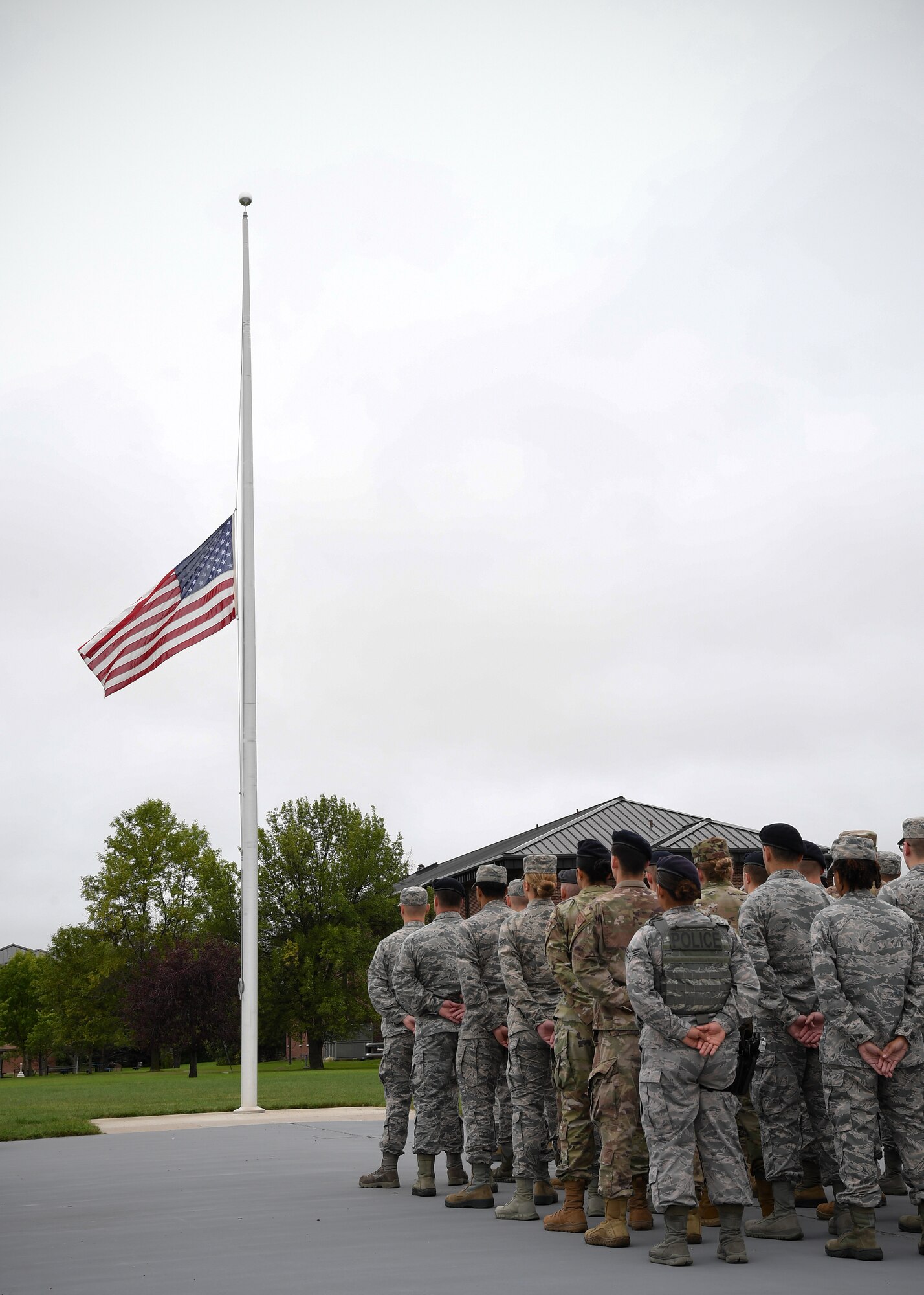 Members of the 319th Reconnaissance Wing stand in formation as part of a memorial ceremony Sept.11, 2019, on Grand Forks Air Force Base, North Dakota. The ceremony honored all who died in the 9/11 attacks, and paid tribute to all emergency response personnel who responded and gave their lives rescuing victims. (U.S. Air Force photo by Senior Airman Elora J. Martinez)