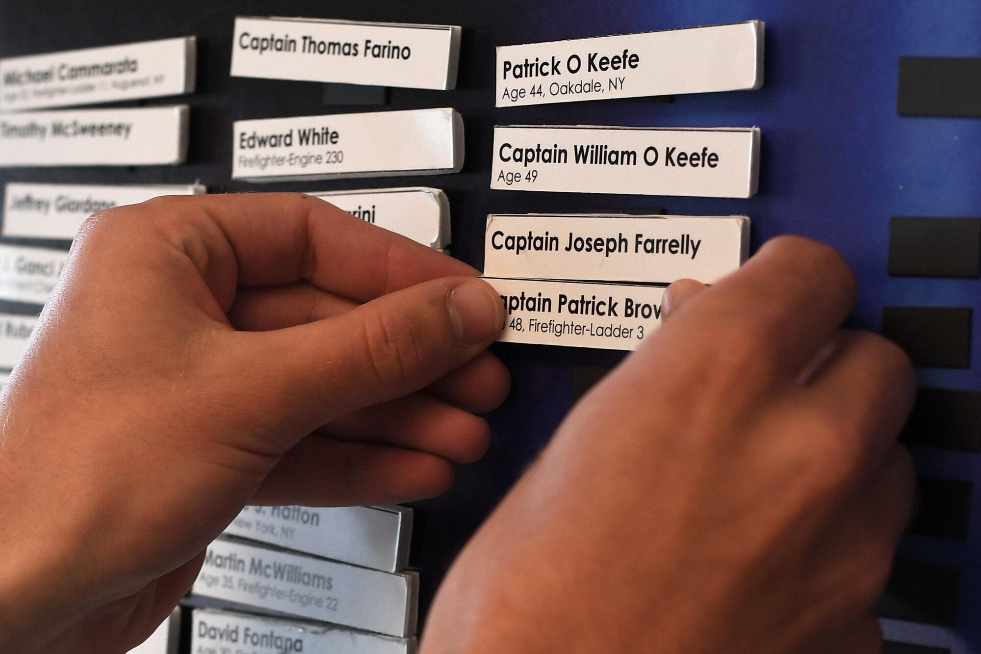 Names of 9/11 victims are placed on a board to honor their lives during a memorial stair climb Sept.11, 2019, in the air traffic control tower on Grand Forks Air Force Base, North Dakota. The names were placed on the board by participants of the climb, who completed 14 trips up the tower to equate the World Trade Center’s 110 stories. In total, nearly 3,000 people died as a result of the terrorist attacks in New York, Washington, D.C., and Pennsylvania.  (U.S. Air Force photo by Senior Airman Elora J. Martinez)