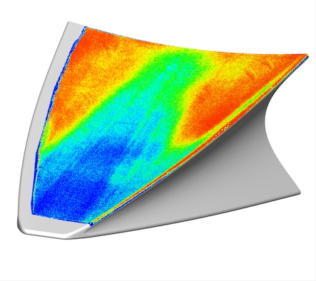 This image presents a visualization of the surface heat transfer on the full-scale Boundary Layer Transition, or BOLT, experiment model in the CUBRC LENS II shock tunnel in Buffalo, New York. Areas of higher heating, which are seen in orange and red, are due to boundary-layer transition. The aim of the BOLT experiment, which is being sponsored by the Air Force Research Laboratory/Air Force Office of Scientific Research and conducted by the Johns Hopkins University Applied Physics Laboratory (JHU-APL), along with the University of Minnesota, Purdue University, Texas A&M University, AFRL Aerospace Systems Directorate, NASA Langley, CUBRC, VirtusAero and DLR in Germany, is to predict the state of the boundary layer, or the thin layer of air near the surface, of the new canonical shape shown in the photo. Personnel at AEDC Hypervelocity Wind Tunnel 9 in White Oak, Maryland, provided training to JHU-APL staff members on how to install instrumentation used to measure temperatures on the BOLT hardware. (Courtesy photo by Air Force Office of Scientific Research/Johns Hopkins University Applied Physics Laboratory)