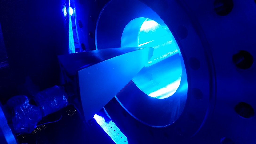 The Boundary Layer Transition, or BOLT, subscale model is tested in the Purdue University Mach-6 Quiet Tunnel. The aim of the basic science BOLT experiment, which is being sponsored by the Air Force Research Laboratory/Air Force Office of Scientific Research and conducted by the Johns Hopkins University Applied Physics Laboratory (JHU-APL), along with the University of Minnesota, Purdue University, Texas A&M University, AFRL Aerospace Systems Directorate, NASA Langley, CUBRC, VirtusAero and DLR in Germany, is to predict the state of the boundary layer, or the thin layer of air near the surface, on a new canonical geometry. Personnel at AEDC Hypervelocity Wind Tunnel 9 in White Oak, Maryland, recently provided sensor installation training to JHU-APL staff members. (Courtesy photo by Air Force Office of Scientific Research/Johns Hopkins University Applied Physics Laboratory)