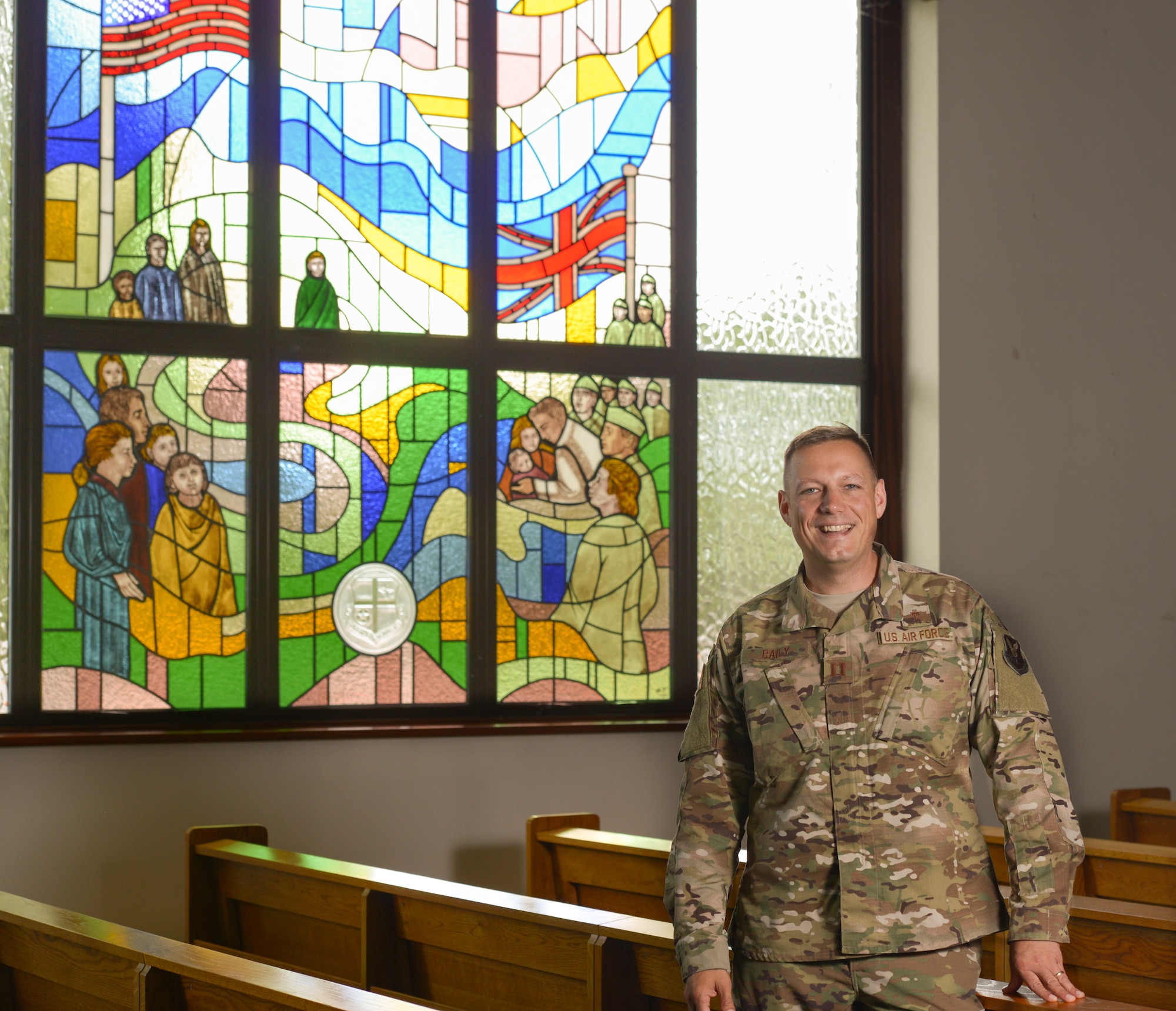 Captain Graham Baily, Chaplain assigned to the 509th Bomb Wing, stands in the chapel at Royal Air Force Fairford, England. Baily was deployed with members of the 509th Bomb Wing for the Bomber Task Force mission. His role in the mission is to provide for and accommodate Airmen’s First Amendment right to freely exercise their religion. Baily also provides pastoral care which includes privileged counseling, worship services, and morale trips for the Airmen on this deployment.