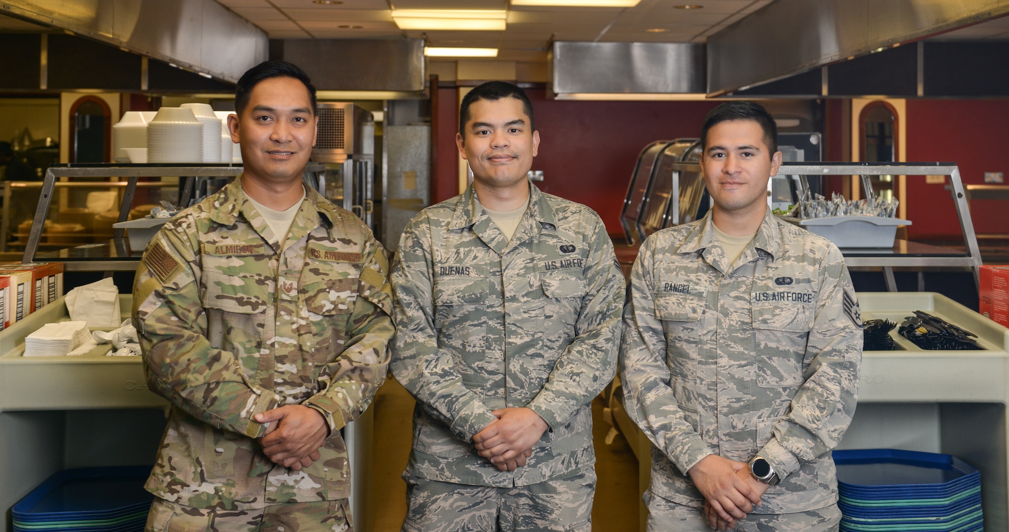 Technical Sergeant Flint Almiron, Staff Sergeant Jose Rangel, and Airman 1st Class Daniel Duenas, services Airmen assigned to the 509th Force Support Squadron, work in the dining facility at Royal Air Force Fairford, England, during the Bomber Task Force mission. These Airmen work as quality assurance and oversee the contract dining facility workers to ensure quantity and quality of the food served to Airmen during the Bomber Task Force Deployment.