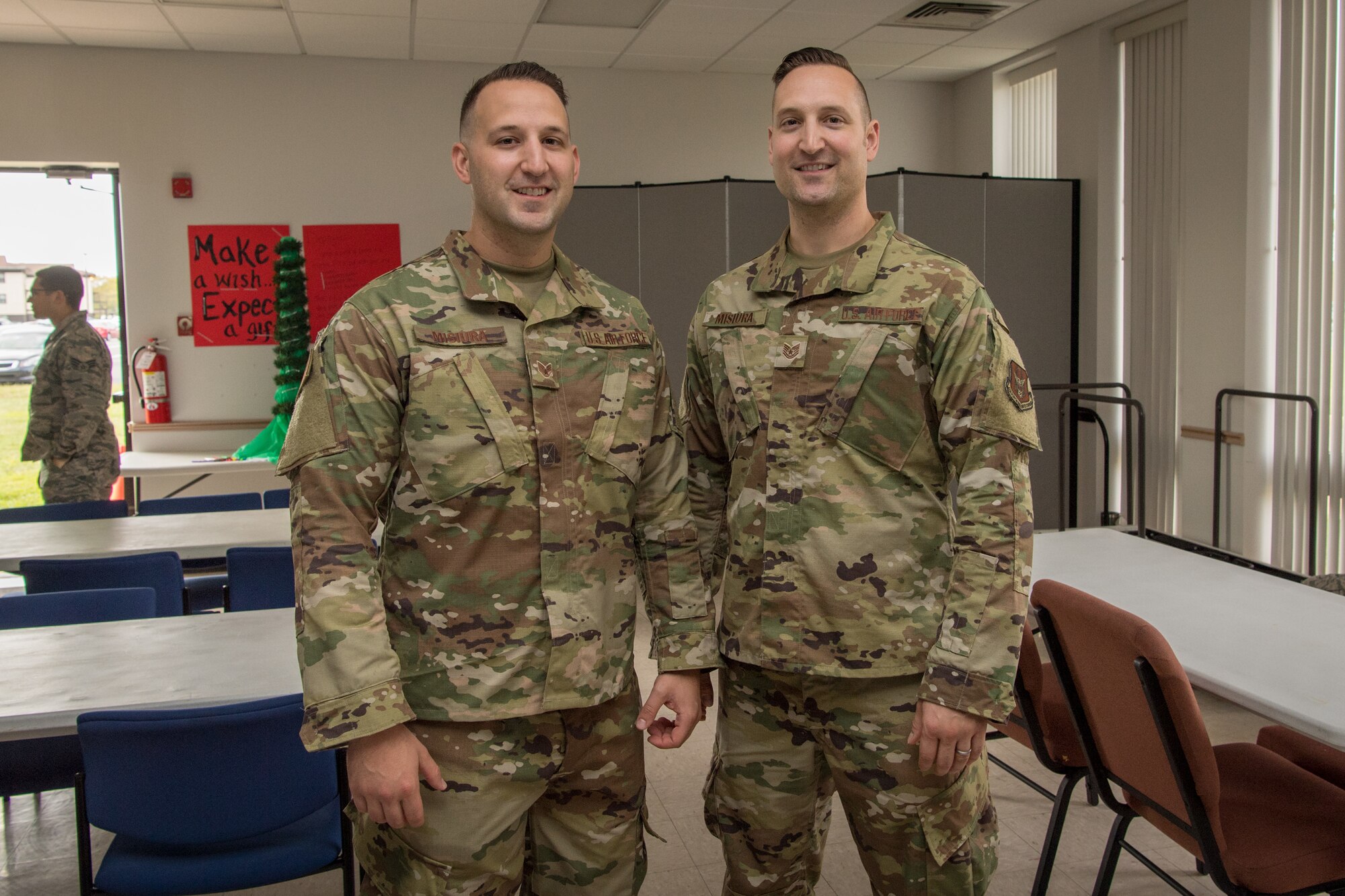 Tech. Sgt. David Misiura Jr., and his brother Staff Sgt. Josiah D. Misiura, both air transportation specialists in the 88th Aerial Port Squadron, 514th Air Mobility Wing at Joint Base McGuire-Dix-Lakehurst, N.J., pose for a photo September 14, 2019. The brothers are among many “Port Dawgs” from the 88th APS who are gearing up to deploy.