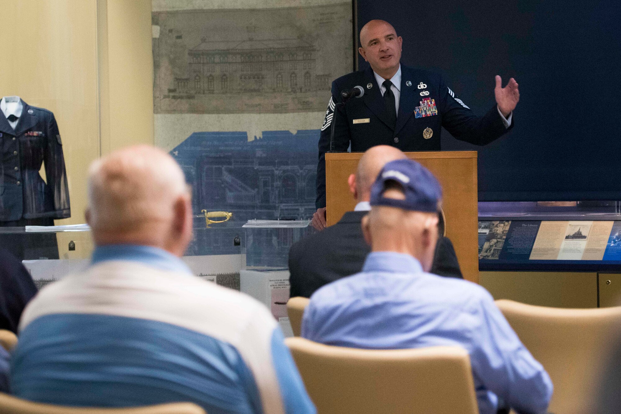 Chief Master Sgt. Christopher M. Yevchak, Air Force District of Washington command chief, speaks at the Armed Forces Retirement Home in Washington D.C., Sept. 13, 2019. Yevchak was the guest speaker for the AFRH's 72nd Air Force birthday celebration for residents and AFDW Airmen. (U.S. Air Force photo by Master Sgt. Michael B. Keller)