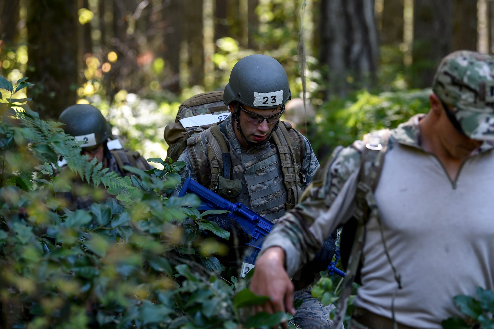 A team of tactical air control party (TACP) officer candidates navigate to a set of given coordinates as part of a land navigation exercise during the TOPT selection course phase II on Joint Base Lewis-McChord, Wash., Aug. 27, 2019. Candidates were required to navigate to five different coordinates where a different team challenge for them to be evaluated on awaited them at each new location.