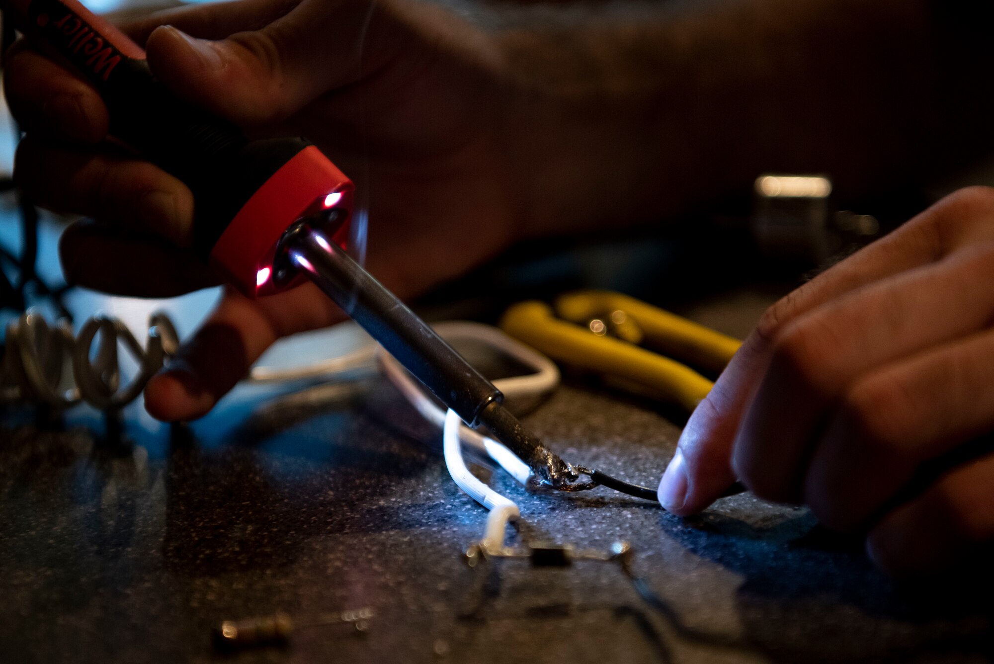 Man melts two wires together
