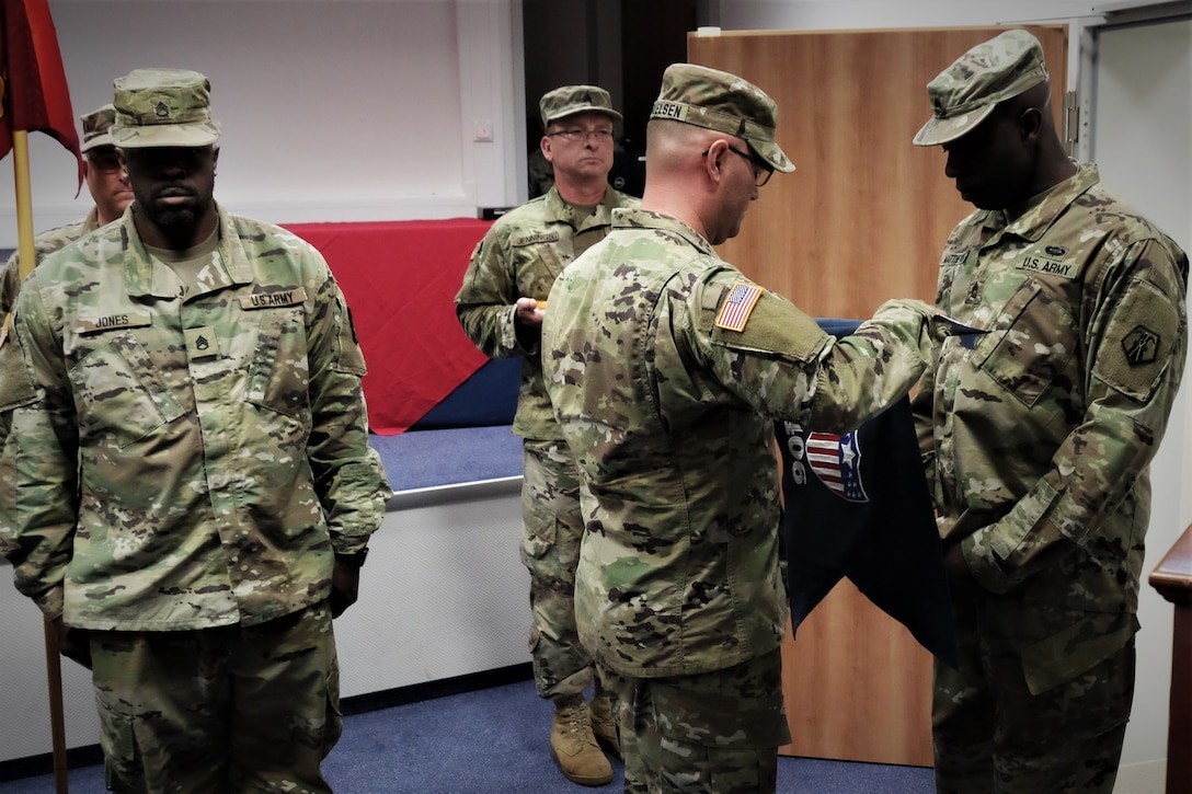 SEMBACH Germany— The leadership of the 406th Human Resources Company, 7th Mission Support Command furls the unit´s guidon to inactivate the unit during the activation ceremony of the 510th Regional Support Group held here at United Sates Army Garrison, Rheinland-Pfalz Sembach Kaserne on Sept. 14, 2019.