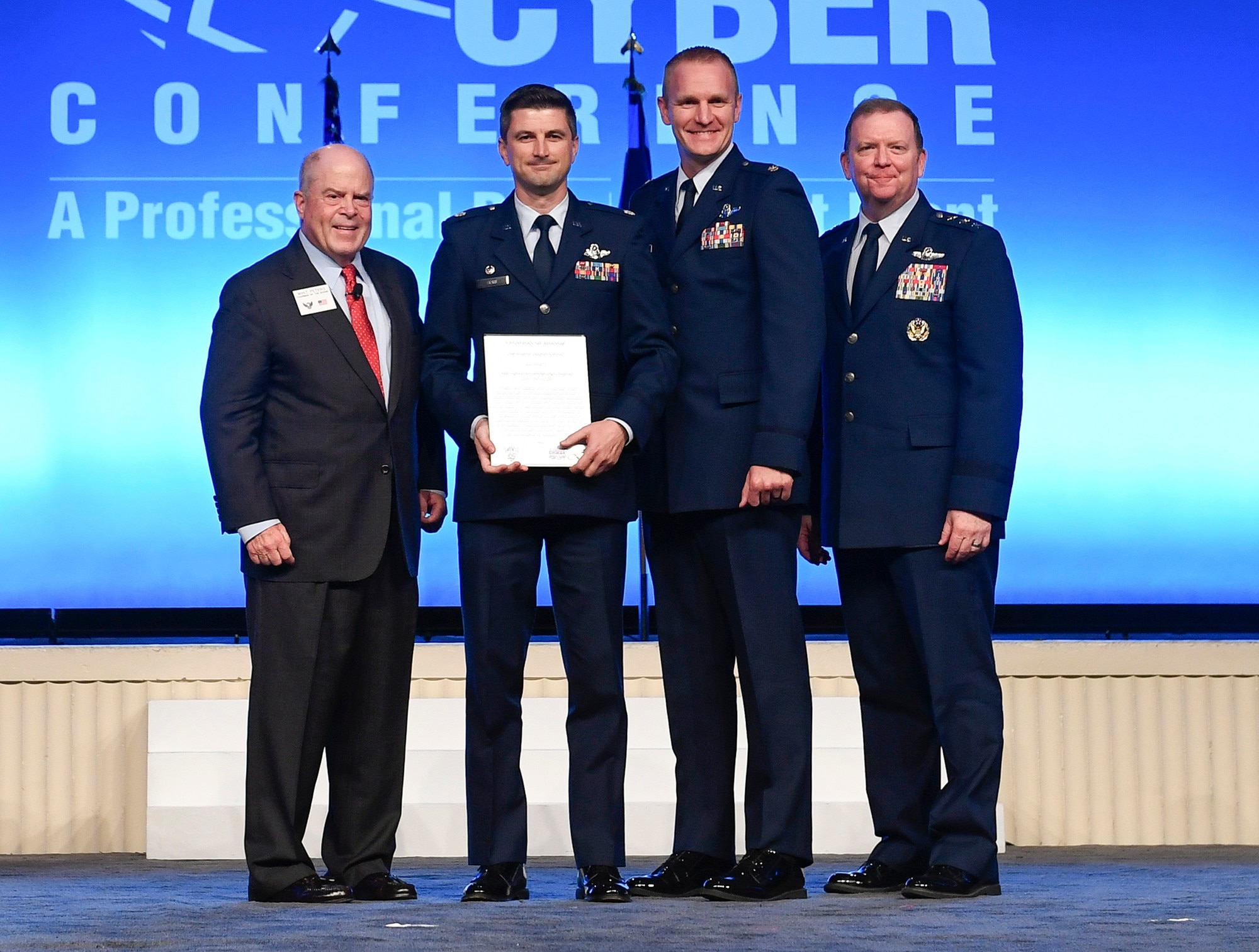 Representatives of the 706th Fighter Squadron receives the Citation of Honor during the Air Force Association Air, Space and Cyber Conference in National Harbor, Md., Sept. 16, 2019. (U.S. Air Force photo by Andy Morataya)