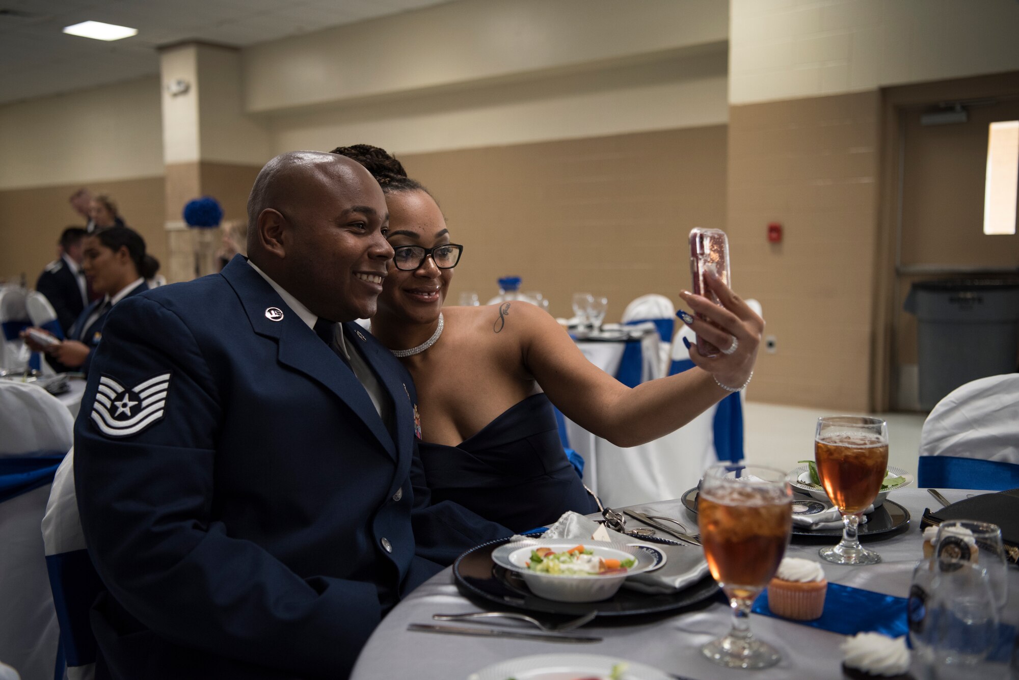 Tech. Sgt. Christopher Simon, 47th Communications Squadron knowledge management section chief, and his wife, Jasmine, pose for a selfie at Laughlin’s Air Force Ball in Del Rio, Texas, Sept. 13, 2019. Selfies were in no short supply the night of Laughlin’s Air Force Ball, as mess dresses and semi-formal uniforms got pulled out of dry cleaning to celebrate the Air Force’s 72nd birthday, as well as the 47th year as the 47th Flying Training Wing. (U.S. Air Force photo by Staff Sgt. Benjamin N. Valmoja)