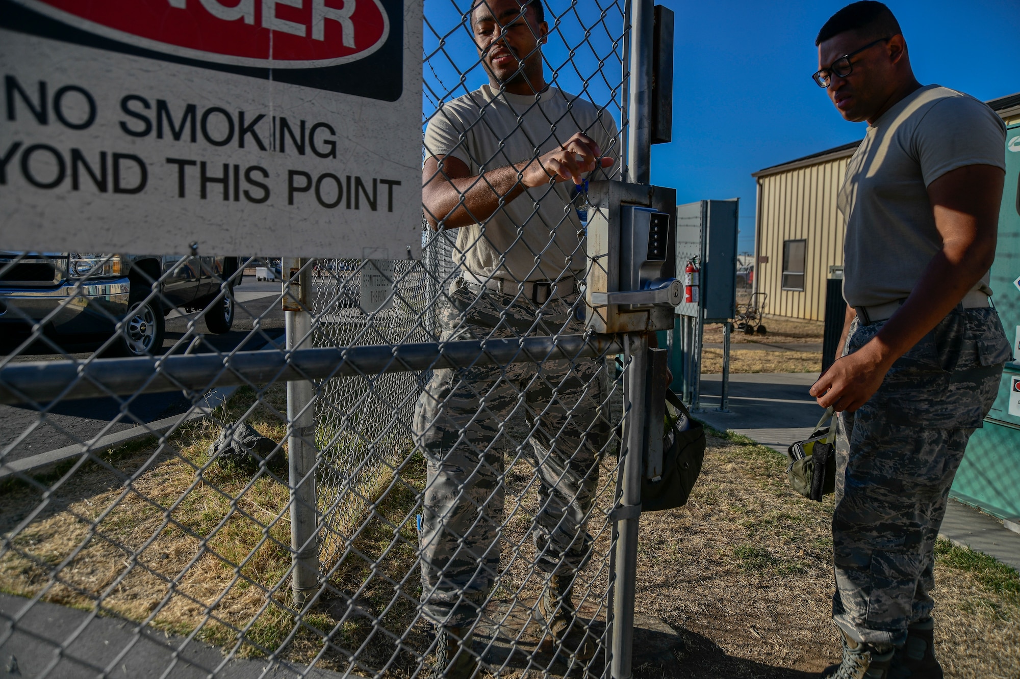 Airman 1st Class Tyrese Kirk and A1C Roderius Spearman, 9th Logistics Readiness Squadron Petroleum, Oil and Lubricants fuels distribution system operators, walk to their fuel trucks during a refueling exercise September 6, 2019 at Beale Air Force Base, California. (U.S. Air Force photo by Tech. Sgt. Alexandre Montes)