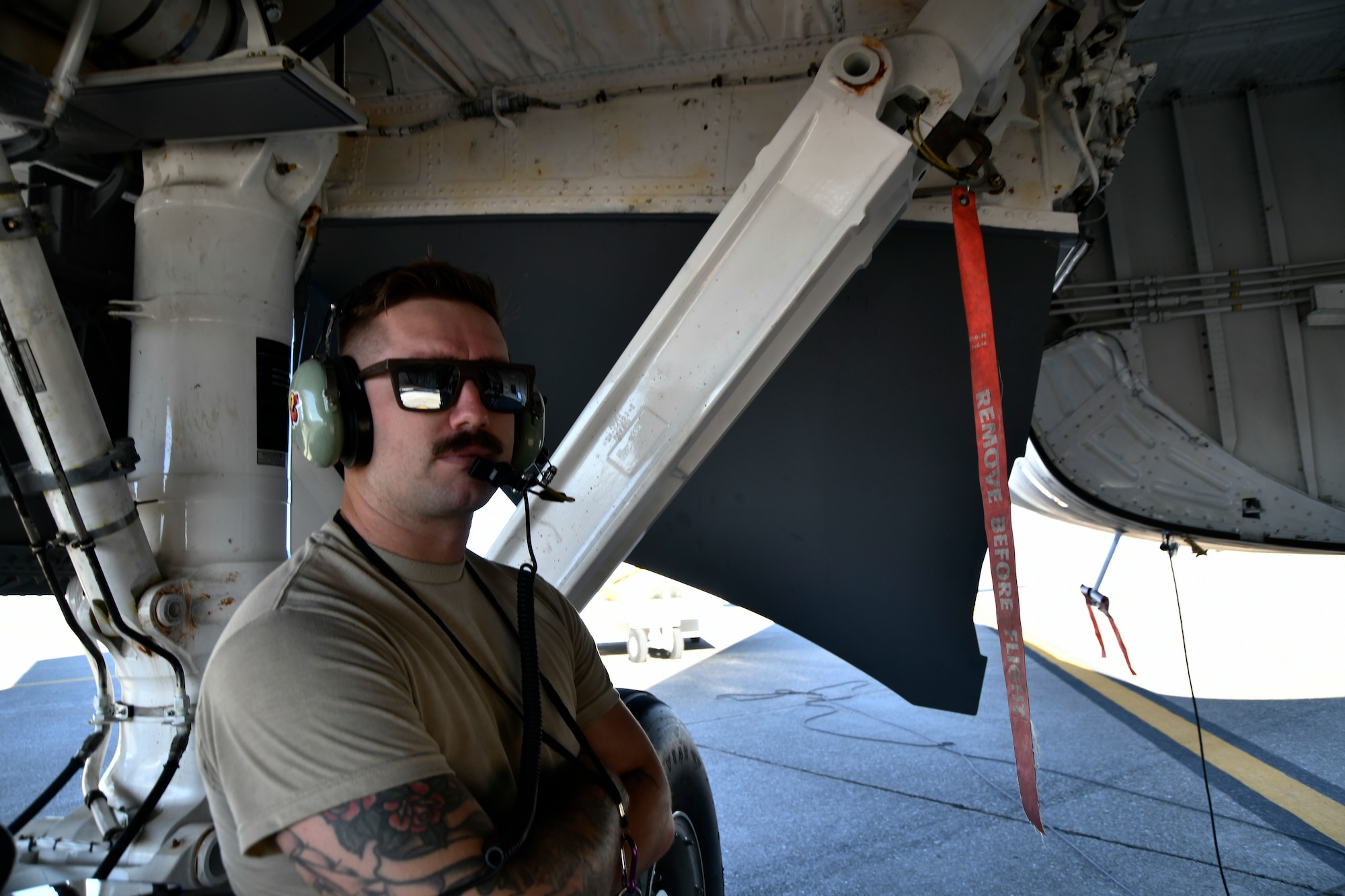 Staff Sgt. Brandon Buhler, 940th Aircraft Maintenance Squadron crew chief, watches the fuel gauge of a KC-135 Stratotanker during a refueling exercise September 6, 2019 at Beale Air Force Base, California. (U.S. Air Force photo by Tech. Sgt. Alexandre Montes)