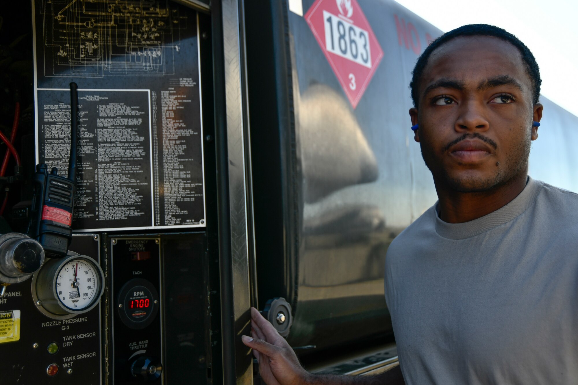 Airman 1st Class Tyrese Kirk, 9th Logistics Readiness Squadron Petroleum, Oil and Lubricants flight fuels distribution system operator, listens for the signal to close the fuel valve during a refueling exercise September 6, 2019 at Beale Air Force Base, California. (U.S. Air Force photo by Tech. Sgt. Alexandre Montes)