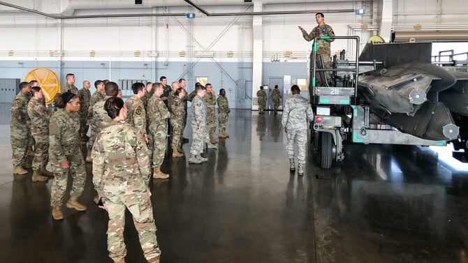 Striker Stripe attendees tour the Kidd Weapons Load Training facility at Barksdale Sept. 11, 2019.