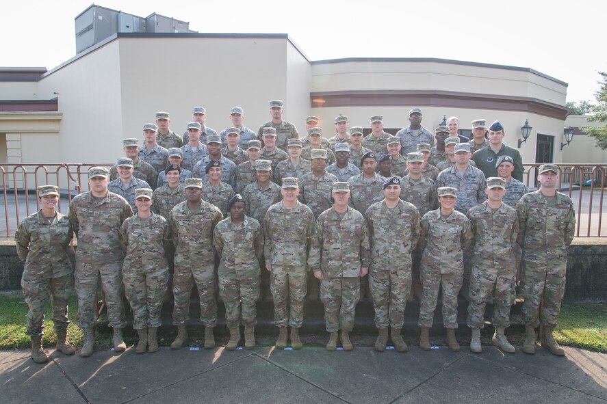 Gen. Tim Ray, Air Force Global Strike Command commander, poses for a photo with Striker Stripe attendees at Barksdale Sept. 10, 2019.