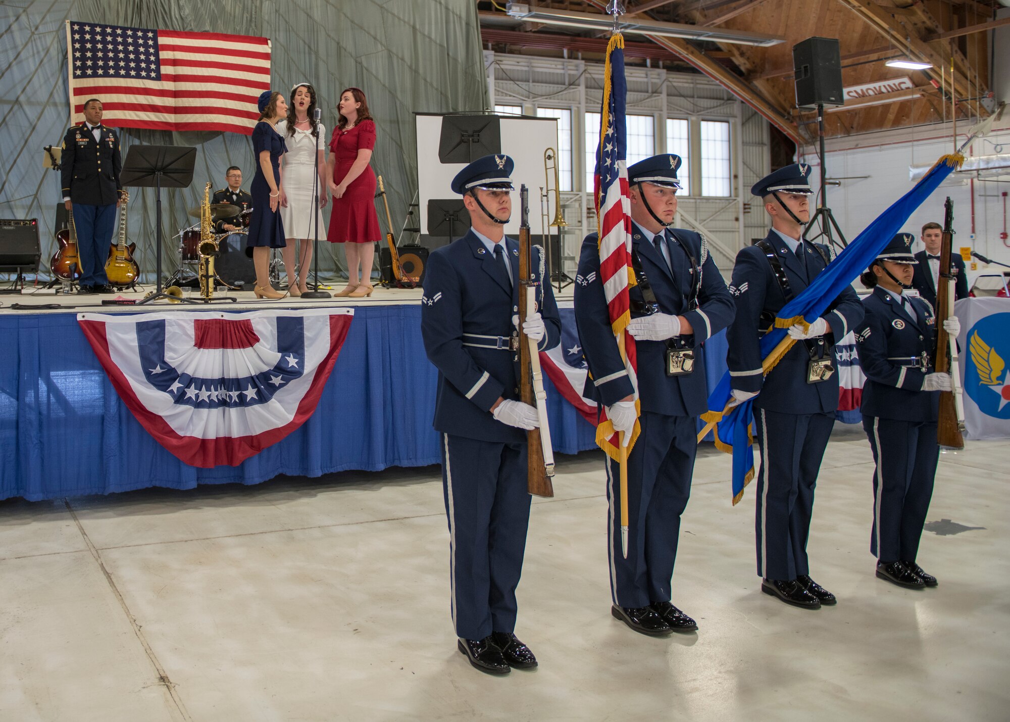 Chloe Hagener, Hilary Marshall and Katie Babbitt (left to right), vocalists from the local community theater, sing the National Anthem at the Air Force Ball, Sept. 14, 2019, on Holloman Air Force Base, N.M. Every September, the Air Force Ball is celebrated by bases all over the world to commemorate the day the United States Air Force was established: Sept. 18, 1947. (U.S. Air Force photo by Airman 1st Class Kindra Stewart)