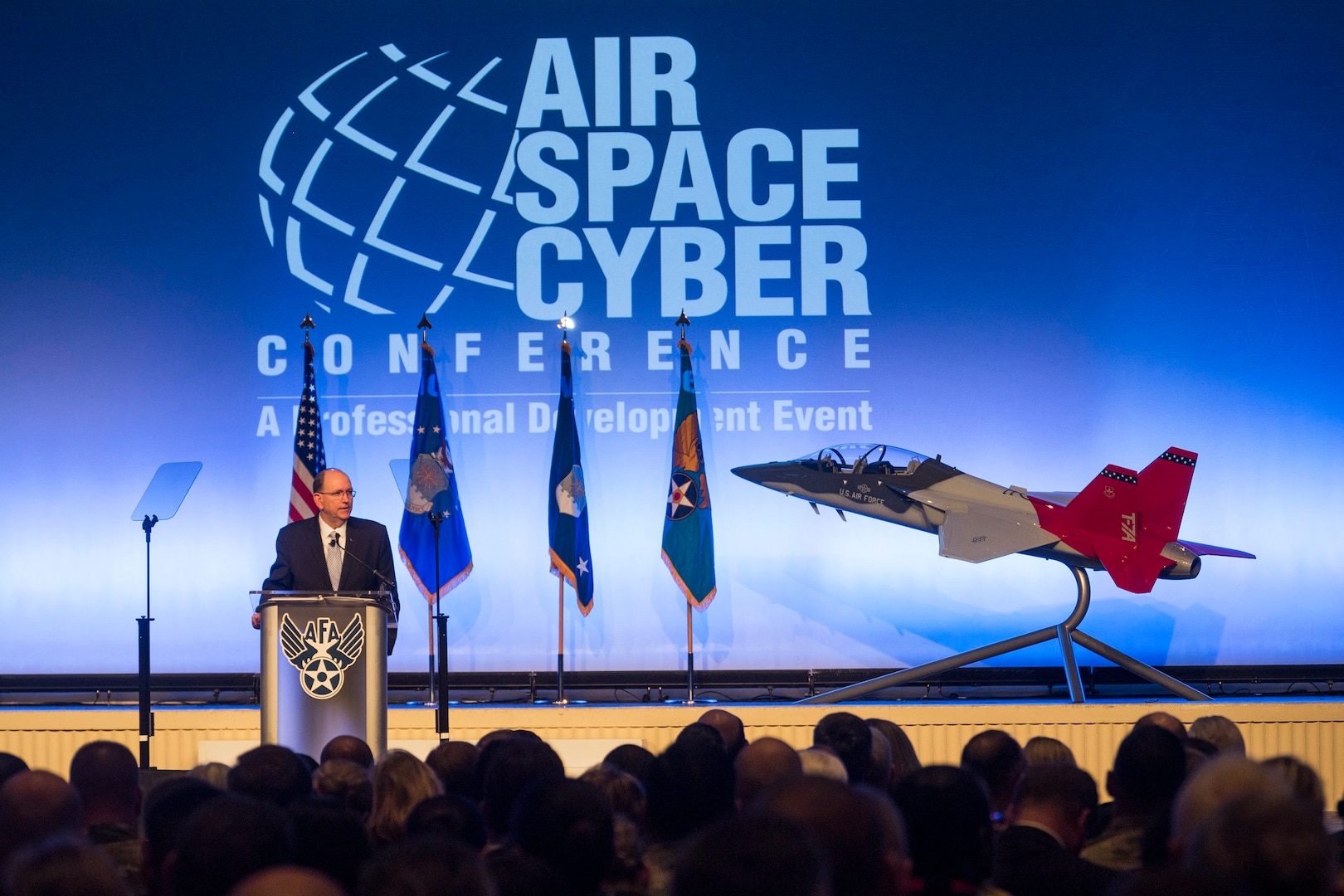 Acting Secretary of the Air Force Matthew P. Donovan reveals the name of the new Air Force trainer aircraft to be the T-7A Red Hawk during the Air Force Association Air, Space and Cyber Conference in National Harbor, Maryland Sept. 16.