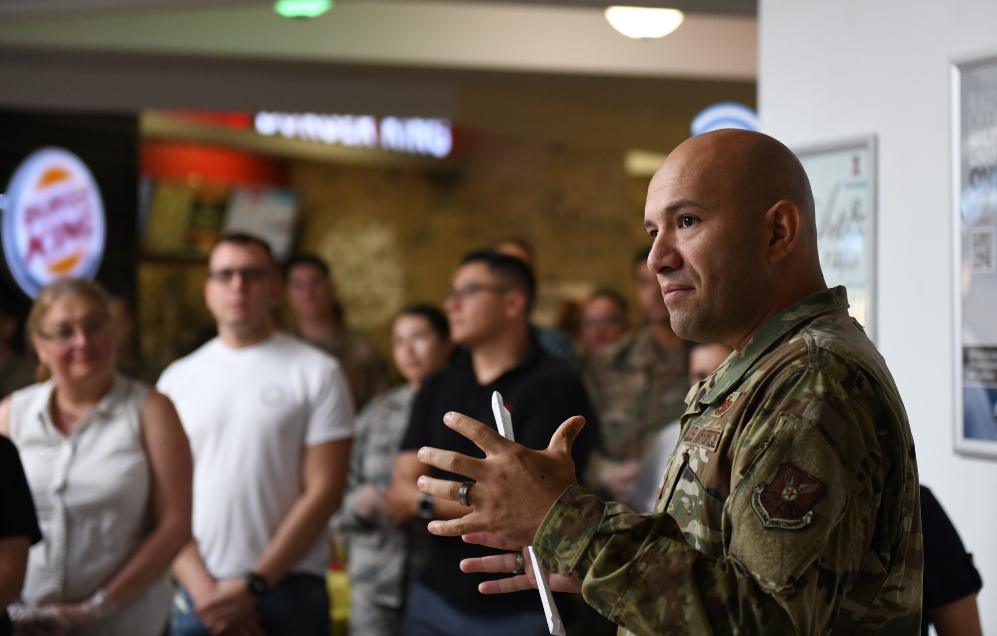 Maj. Jose Crespo, the 28th Logistics Readiness Squadron commander, delivers opening remarks at the ‘Taste of Latin America’ food tasting event, held at the Base Exchange food court, on Ellsworth Air Force Base, S.D., Sept. 16, 2019. Crespo spoke about the many accomplishments and contributions of Hispanic and Latin American service members throughout history, as well as the diversity found amongst Latino communities. (U.S. Air Force photo by Airman 1st Class Christina Bennett)