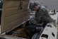 U.S. Army Spc. Daniel Mitchell, a heavy vehicle operator with the 597th Transportation Brigade, 832nd Trans. Battalion, 688th Rapid Port Opening Element, performs preventative maintenance checks on a truck at Joint Base Langley-Eustis, Virginia, Sept. 16, 2019. The Soldiers of the 688th RPOE conduct preventive maintenance every week to ensure the unit’s vehicles are working properly. (U.S. Air Force photo by Senior Airman Derek Seifert)