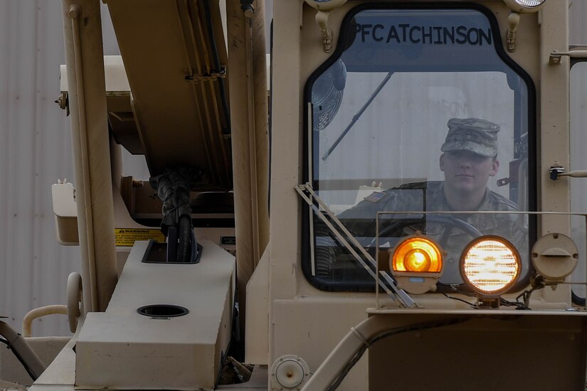 U.S. Army Pfc. Staci Kirkland, cargo specialist with the 597th Transportation Brigade, 832nd Trans. Battalion, 688th Rapid Port Opening Element, raises the arm of a forklift at Joint Base Langley-Eustis, Virginia, Sept. 16, 2019. The 10K forklift is used by the 688th RPOE during training to ensure Soldiers are experienced in the functions of the machine. (U.S. Air Force photo by Senior Airman Derek Seifert)