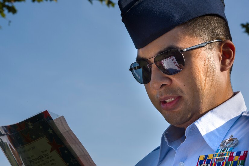 U.S. Air Force U.S. Air Force Master Sgt. Gerald, 30th Intelligence Squadron, reads names during the 18th annual “Reading of the Names” at Gosnold's Hope Park, Sept. 11, 2019. At the event each volunteer picked up a list of names of the fallen and read them aloud around the memorial trees in the park. (U.S. Air Force Photo by Tech Sgt. Carlin Leslie)