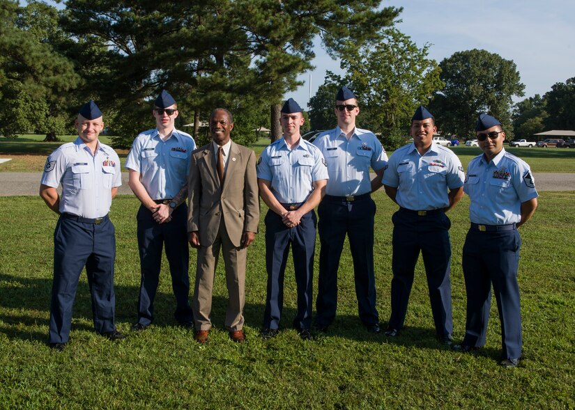Mayor Donnie Tuck, Hampton City, poses for a photo with 30th Intelligence Squadron U.S. Air Force Airmen following the 18th annual “Reading of the Names” at Gosnold's Hope Park, Sept. 11, 2019. Civic Leaders and residents joined the Airmen to honor those killed in the terrorist attacks of 9/11 and those who paid the ultimate sacrifice in Iraq and Afghanistan. (U.S. Air Force Photo by Tech Sgt. Carlin Leslie)