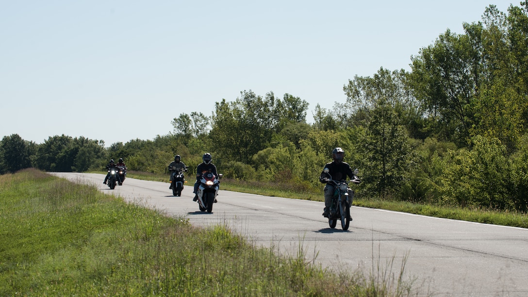 Airmen with the 509th Munitions Squadron participate in a motorcycle safety ride on August 28, 2019, at Whiteman Air Force Base, Missouri. The Airmen formed up into a staggered formation, providing a safe distance between each rider after talking about how to safely ride as a group. (U.S. Air Force photo by Airman 1st Class Parker J. McCauley)