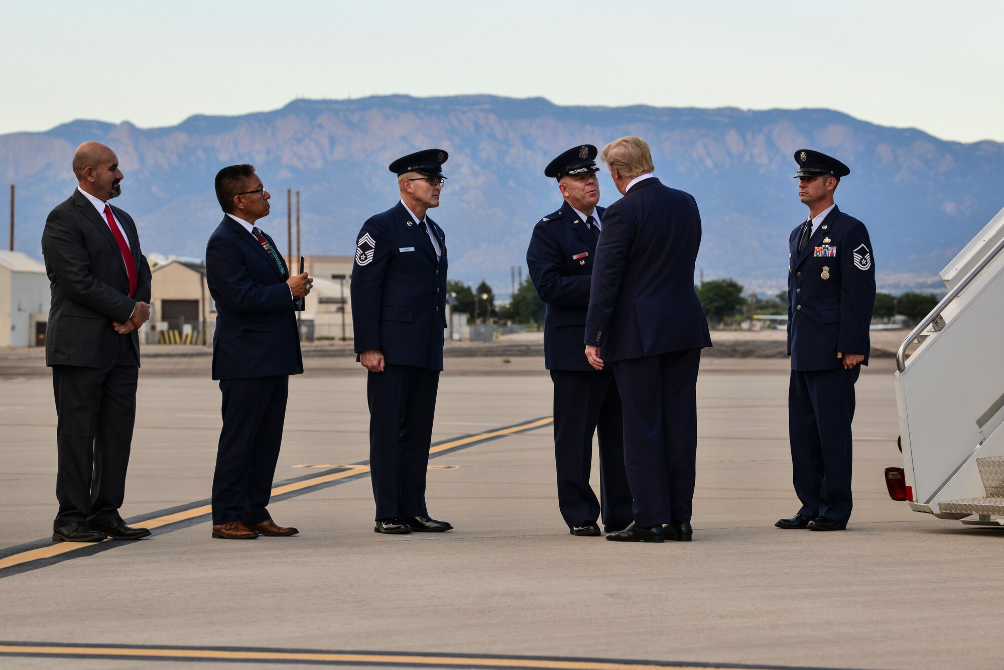 President Donald J. Trump greets the leadership of Team Kirtland at Kirtland Air Force Base, N.M., Sept. 16, 2019. After departing Joint Base Andrews, Md., the President landed at Kirtland and was greeted by members of the base. (U.S. Air Force photo by Staff Sgt. Kimberly Nagle)