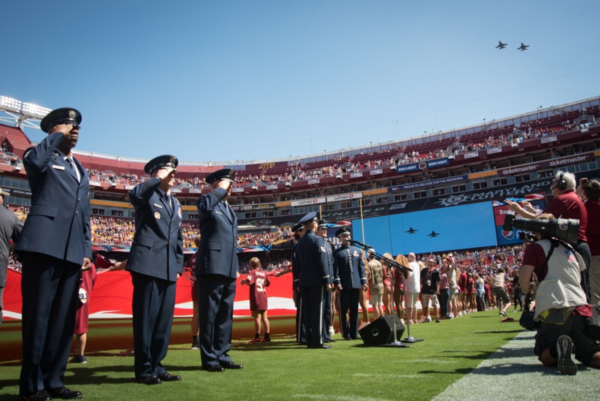 D.C. Air National Guard F-16s fly over FedEx Field in the opening ceremony of the NFL Washington Redskins vs. Dallas Cowboys game, September 15, 2019. The Washington Redskins recognized the Air Force throughout the game to honor the Air Forces 72nd birthday. (U.S. Air National Guard photo by Tech. Sgt. Erica Flores)