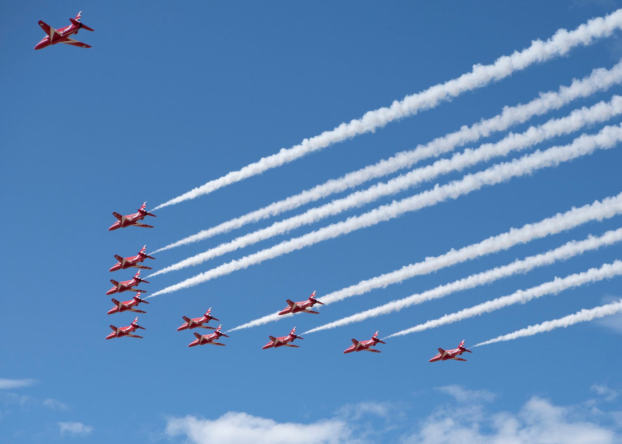 Royal Air Force aerial demonstration team the Red Arrows flies past Peterson Air Force Base, Colorado, before landing Sept. 16, 2019. The team stopped at the base as part of their North American tour. (U.S. Air Force photo by Heather Heiney)