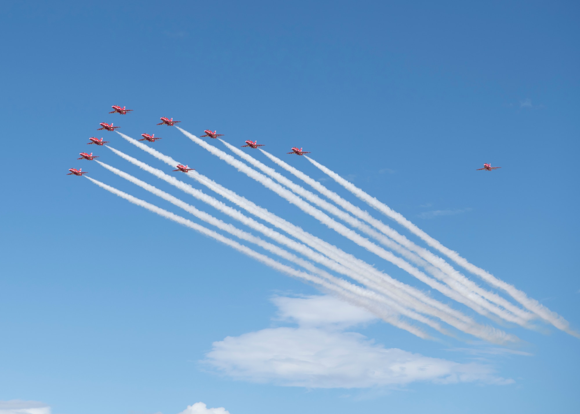 Royal Air Force aerial demonstration team the Red Arrows flies past Peterson Air Force Base, Colorado, before landing Sept. 16, 2019. The team stopped at the base briefly as part of their North American tour. (U.S. Air Force photo by Heather Heiney)
