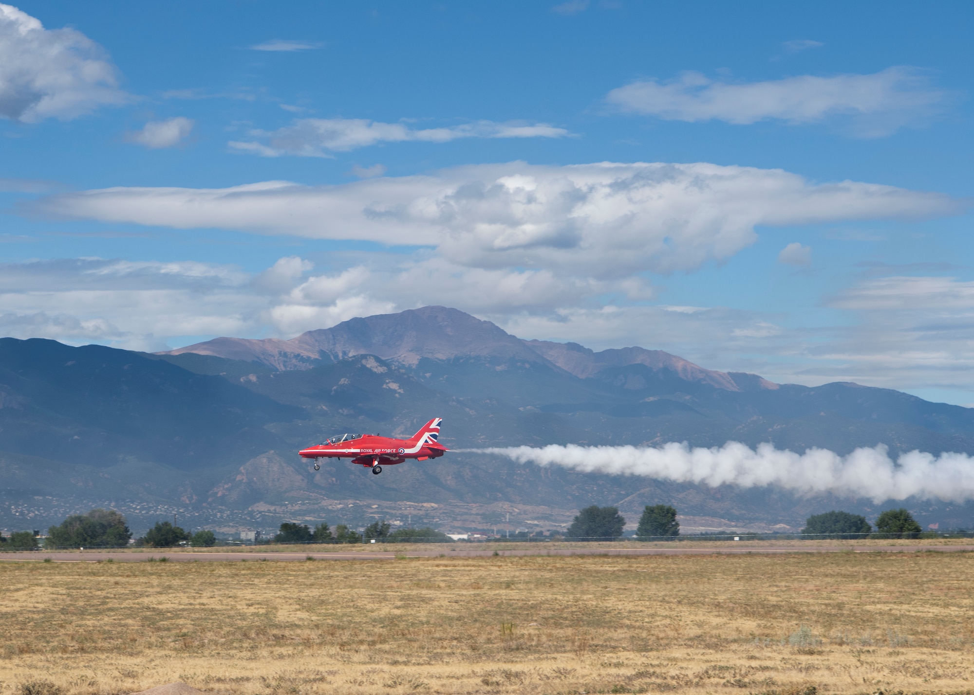 A pilot from the Royal Air Force aerial demonstration team, the Red Arrows, lands a Hawk T1 aircraft Sept. 16, 2019 at Peterson Air Force Base, Colorado. The demonstration team stopped at Peterson AFB as part of their North American tour. (U.S. Air Force photo by Heather Heiney)