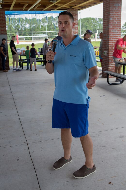 Marine Lt. Col. Gregory P. DeMarco, commanding officer of Marine Wing Headquarters Squadron 2, welcomes Marines and Sailors to the unit’s Family Fun Day at Marine Corps Air Station Cherry Point, North Carolina, August 20, 2019. The Family Fun Day was hosted to give Marines and Sailors an opportunity to socialize and build camaraderie throughout the unit.   (U.S. Marine Corps photo by Pfc. Steven Walls)