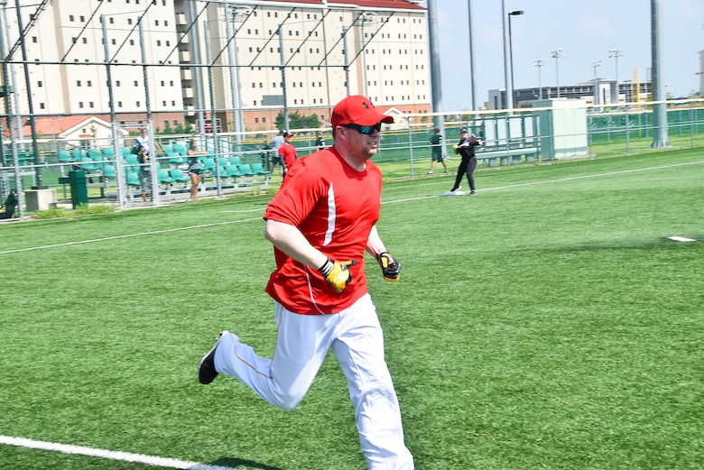Brian Quiroga, a U.S. Army Corps of Engineers, Far East District project manager, runs to first base during a fall tournament softball game, Camp Humphreys, South Korea, Sep. 15. The district hasn’t had a team since 2015, and this season decided to participate in the league.