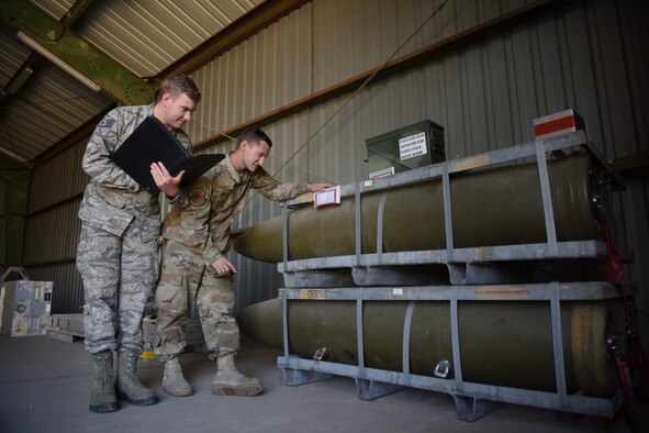 U.S. Air Force Staff Sgt. Gavin Henderson, 39th Maintenance Squadron munitions operations technician, (left), and Staff Sgt. Bryan Gibree, 39th MXS munitions inspection supervisor, inspect bombs during an inventory Sept. 11, 2019, at Incirlik Air Base, Turkey. Munitions Airmen, commonly known as “AMMO troops,” are responsible for the storage, inspection, transportation and issuance of ammunition to various constituents for their respective missions. (U.S. Air Force photo by Staff Sgt. Joshua Magbanua)