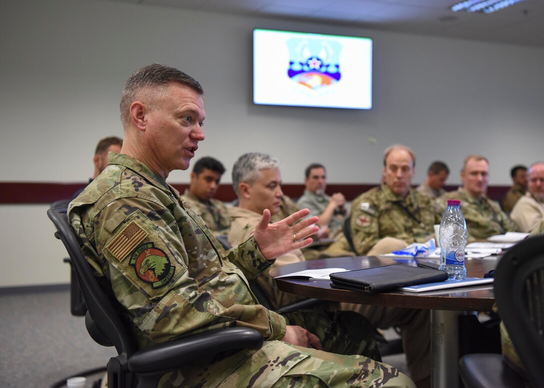 Maj. Gen. Rauch engages in a discussion.