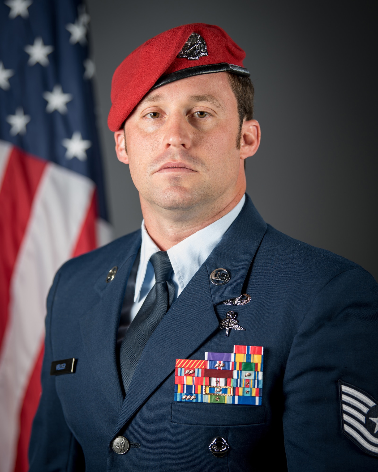 U.S. Air Force Tech. Sgt. Daniel Keller, a combat controller in the 123rd Special Tactics Squadron, Kentucky Air National Guard, is presented with the Air Force Cross by U.S. Air Force Chief of Staff Gen. David L. Goldfein during a ceremony at the Kentucky Air National Guard Base in Louisville, Ky, Aug. 13, 2019. Keller earned the medal for valor on the battlefield in Afghanistan. (U.S. Air National Guard photo by Staff Sgt. Joshua Horton)