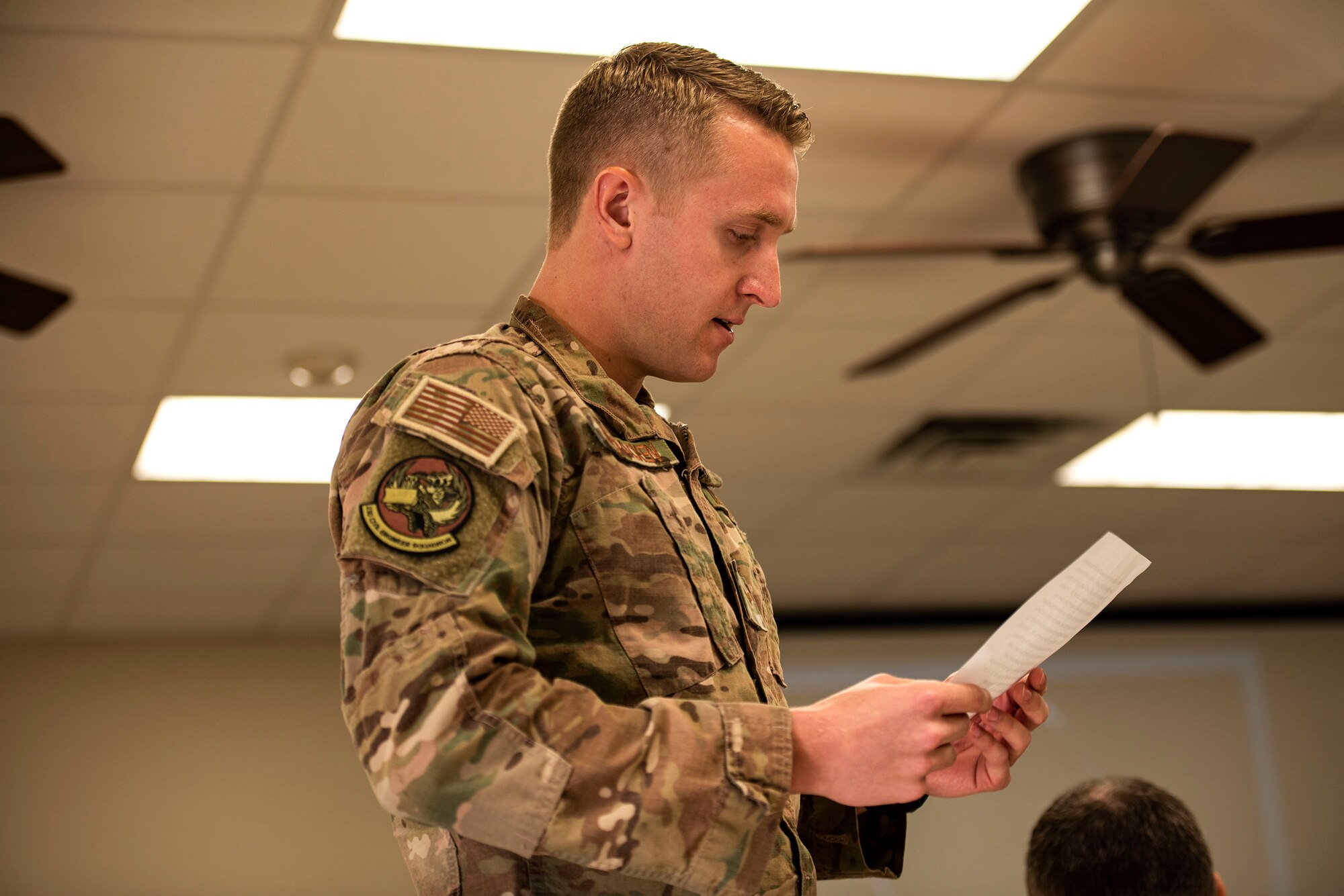 Senior Airman Matthew McCracken, 23d Civil Engineer Squadron explosive ordnance disposal apprentice, reads a scenario during resiliency training Sept. 10, 2019, at Moody Air Force Base, Ga. The event was hosted by the 23d Wing chaplain, and served as an interactive experience for Airmen, providing practical approaches they can use regularly to improve the resiliency culture in their squadrons. (U.S. Air Force photo by Senior Airman Erick Requadt)