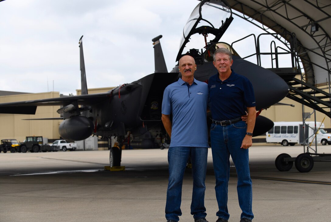 The 15h Chief Master Sgt. of the Air Force Rodney McKinley and Ray Iacomacci pose in front of a F-15E Strike Eagle at Seymour Johnson Air Force Base, North Carolina. (U.S. Air Force Photo by Staff Sgt. Michael Charles)