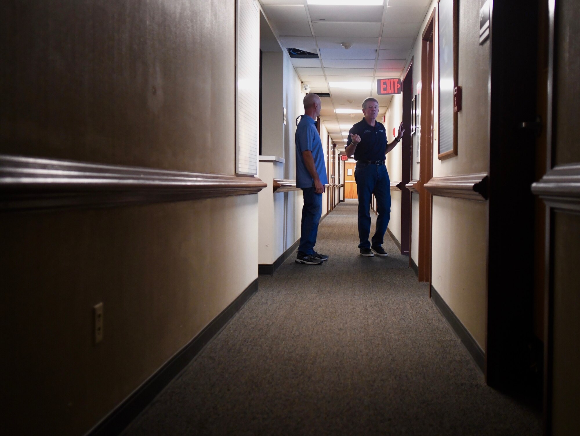 Retired Chief Master Sgt. Rodney McKinley and Ray Iacomacci walk through the old Airman and Family Readiness Center Sept. 13, 2019, at Seymour Johnson Air Force Base, North Carolina. Chief McKinley served as the 15h Chief Master Sgt. of the Air Force from 2006 to 2009. (U.S. Air Force Photo by Staff Sgt. Michael Charles)