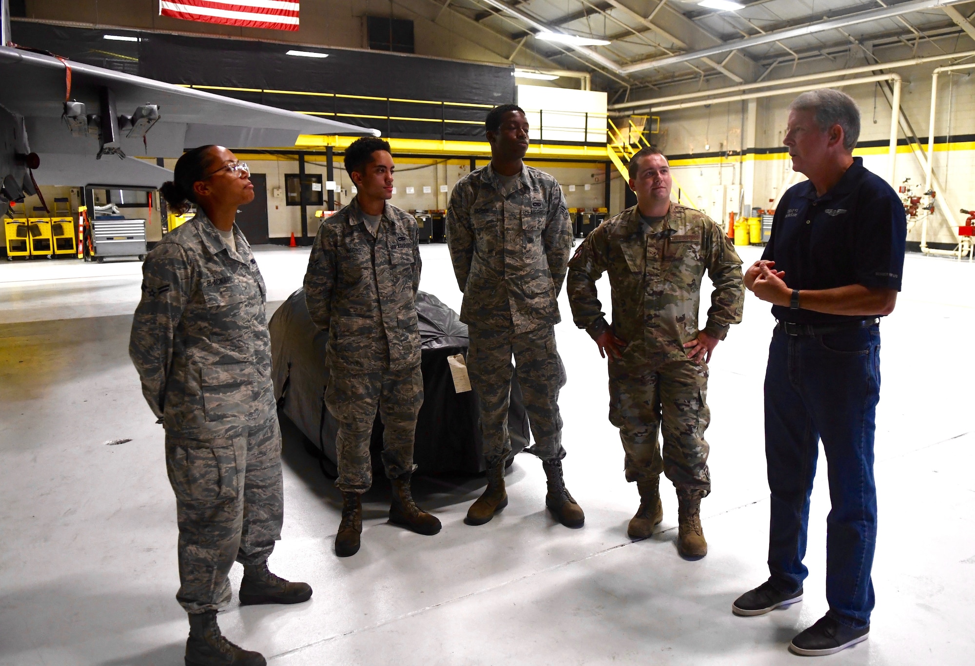 Retired Chief Master Sgt. Rodney McKinley, the 15th Chief Master Sgt. of the Air Force, talks with several Airmen assigned to the 4th Aircraft Maintenance Squadron, Sept. 13, 2019, at Seymour Johnson Air Force Base, North Carolina. Chief McKinley served as the CMSAF from 2006 to 2009. (U.S. Air Force Photo by Staff Sgt. Michael Charles)