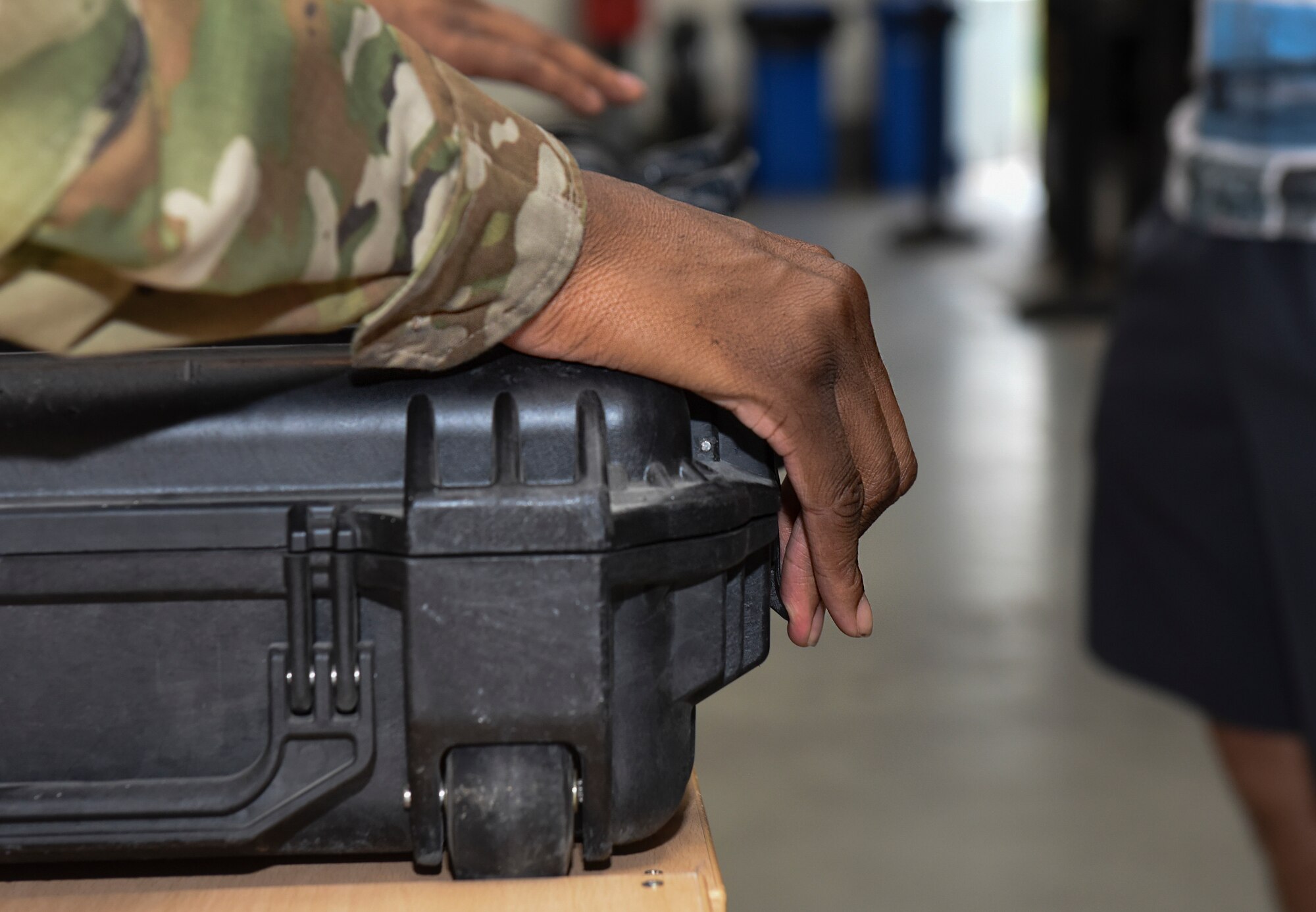U.S. Airman 1st Class JD Nathan, 86th Logistics Readiness Squadron storage and issue apprentice, latches an M16 rifle carrying case at Ramstein Air Base, Germany, Sept. 16, 2019. The 86th LRS practiced issuing weapons and protective gear in preparation for the 86th Airlift Wing Exercise Operation Varsity 19-03, which is designed to evaluate the 86th AW’s ability to respond to contingency.