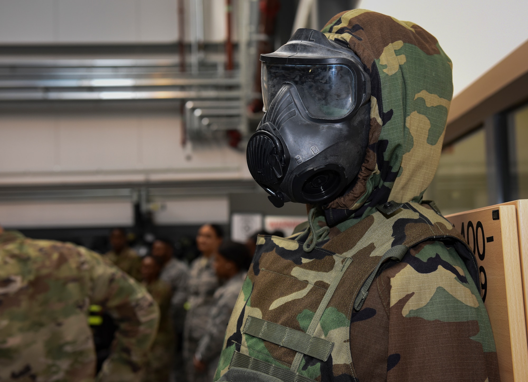 A training mannequin stands on display at the 86th Logistics Readiness Squadron individual protective equipment facility at Ramstein Air Base, Germany, Sept. 16, 2019. The 86th LRS issued chemical, biological, radiological, nuclear, and explosive material protective equipment, like that displayed on the mannequin, to personnel in preparation for the 86th Airlift Wing Exercise Operation Varsity 19-03.