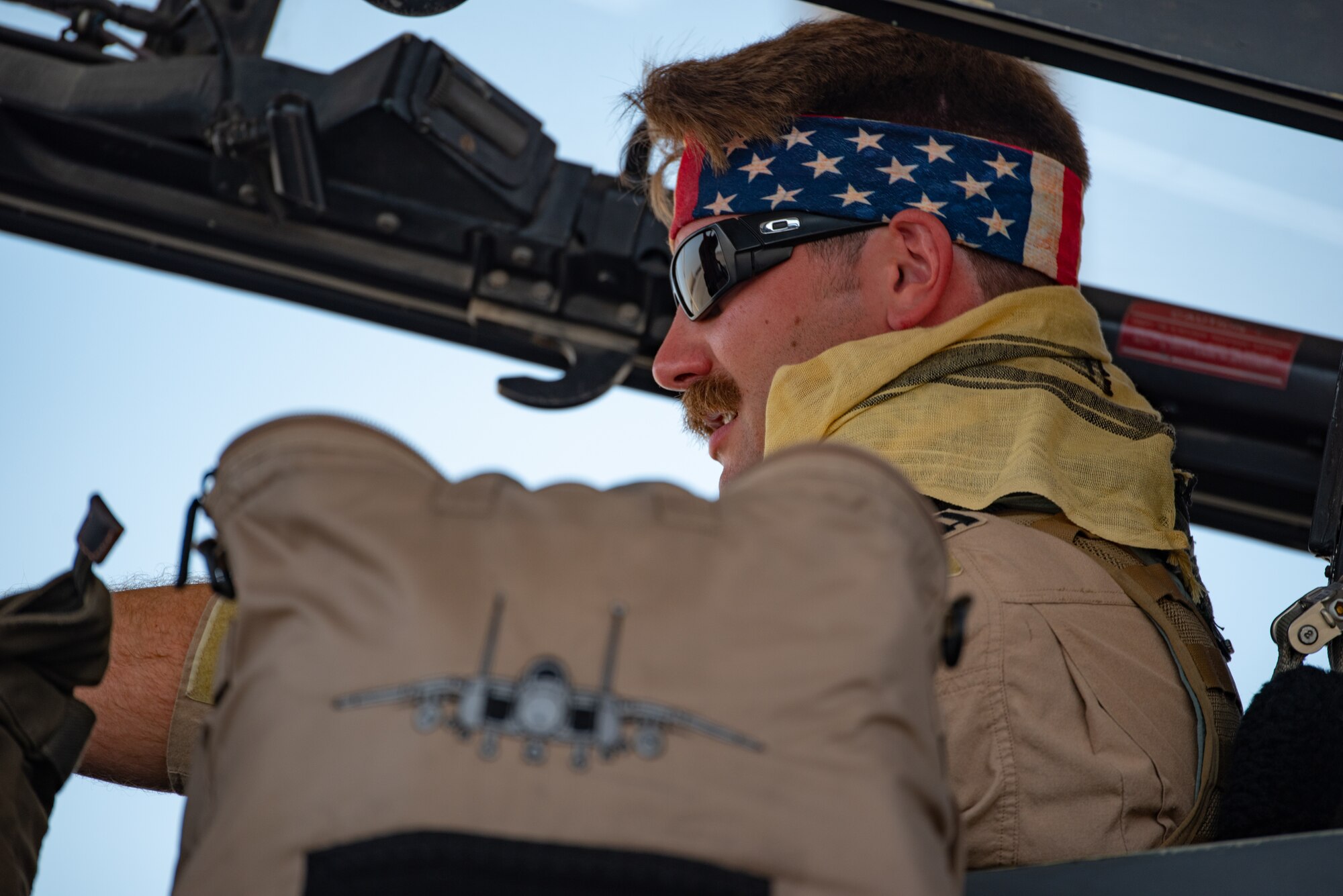 Capt. “Nuke” Messmore, 336th Expeditionary Fighter Squadron combat weapons system officer, prepares for flight for Agile Strike Sept. 18, 2019, at Al Dhafra Air Base, United Arab Emirates. The 336th EFS sent two aircraft and personnel to operate missions out of Prince Sultan Air Base, Saudi Arabia to challenge their flexibility at expanding tactical and strategic reach while strengthening coalition and regional partnerships in the Air Forces Central Command area of responsibility through adaptive basing. (U.S. Air Force photo by Staff Sgt. Chris Thornbury)