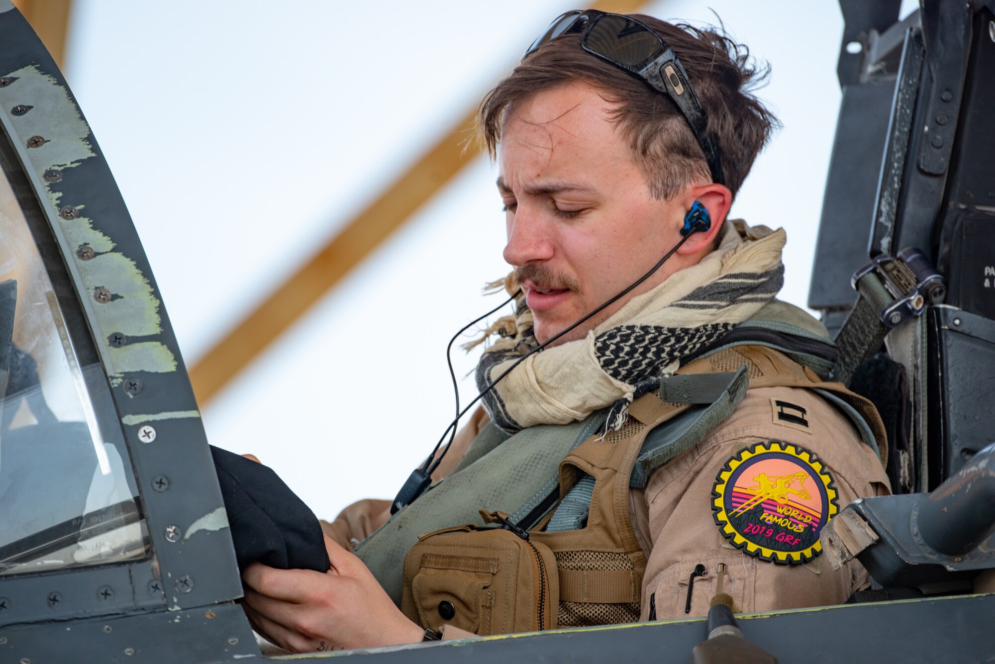 Capt. “Spear” Del Ponte, 336th Expeditionary Fighter Squadron pilot, prepares for flight for Agile Strike Sept. 18, 2019, at Al Dhafra Air Base, United Arab Emirates. The 336th EFS sent two aircraft and personnel to operate missions out of Prince Sultan Air Base, Saudi Arabia to challenge their flexibility at expanding tactical and strategic reach while strengthening coalition and regional partnerships in the Air Forces Central Command area of responsibility through adaptive basing. (U.S. Air Force photo by Staff Sgt. Chris Thornbury)